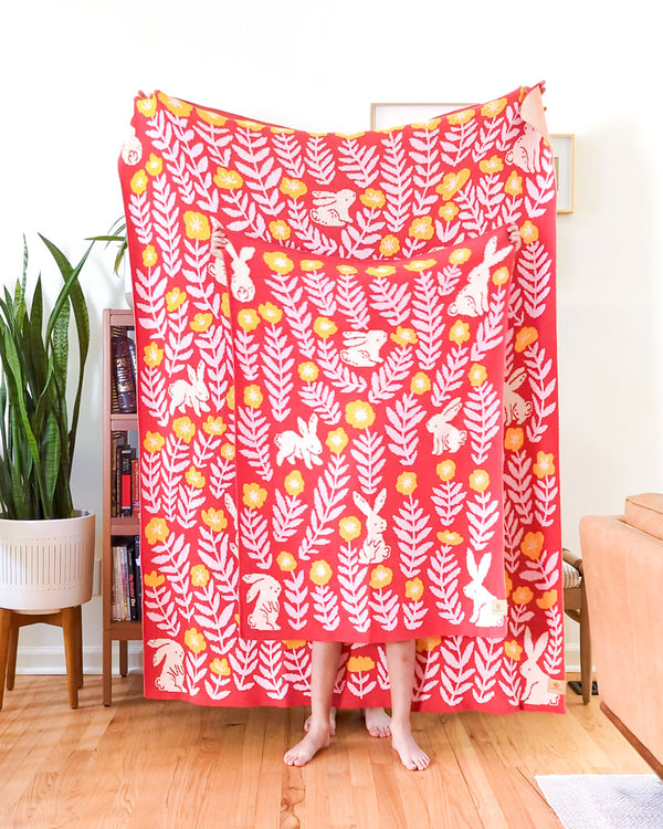 Bunny Meadows Throw Blanket - Coral