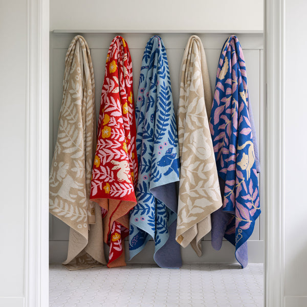 Bunny Meadows Throw Blanket - Coral