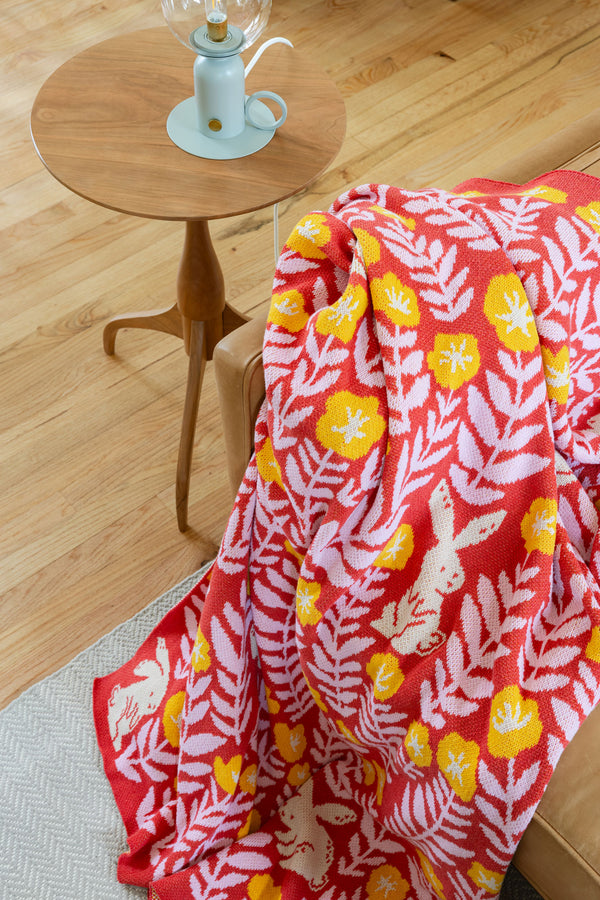Bunny Meadows Throw Blanket - Coral