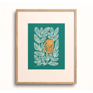 Colorful Chameleon art print displayed in a wooden frame.