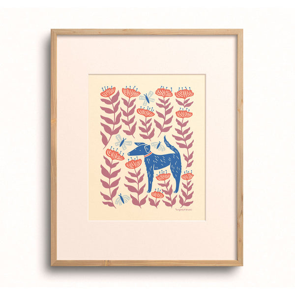 Petal Pup art print by Chrissie Van Hoever displayed in a wooden frame with a white mat.