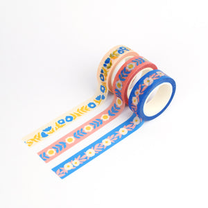 Three rolls of colorful floral washi tape by Nuthatch Studio.