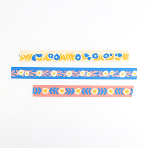 Three strips of colorful floral washi tape by Nuthatch Studio.