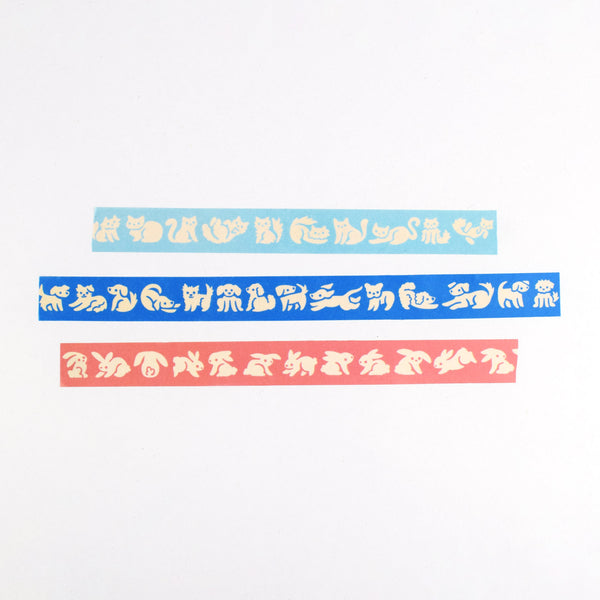 Three strips of colorful washi tape featuring dogs, cats, and rabbits by Nuthatch Studio.