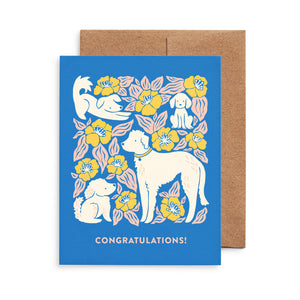 Congratulations greeting card featuring dogs and flowers illustration by Chrissie Van Hoever
