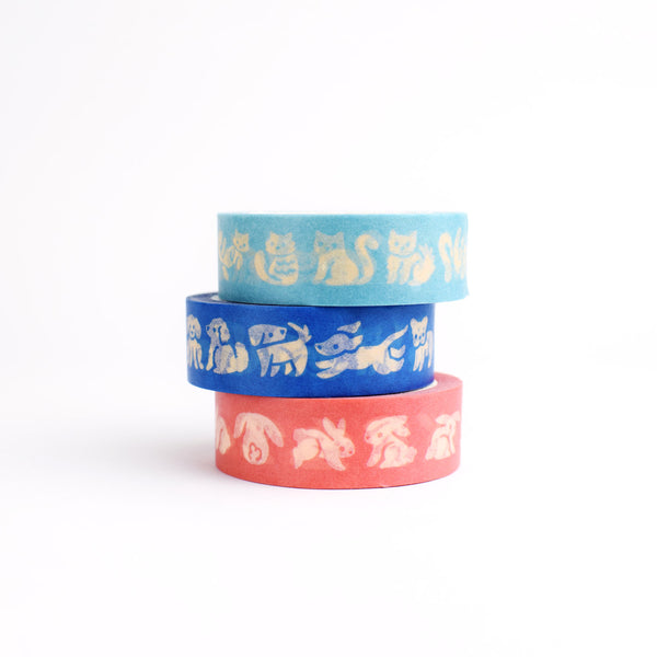 Three rolls of colorful washi tape featuring dogs, cats, and rabbits by Nuthatch Studio.