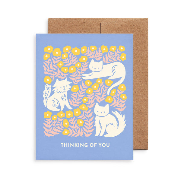 Thinking of you greeting card featuring cats and flowers illustration by Chrissie Van Hoever