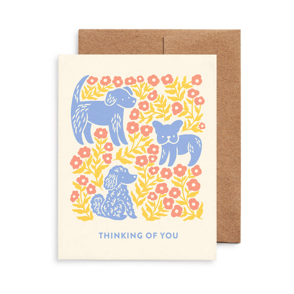 Thinking of you greeting card featuring dogs and flowers illustration by Chrissie Van Hoever