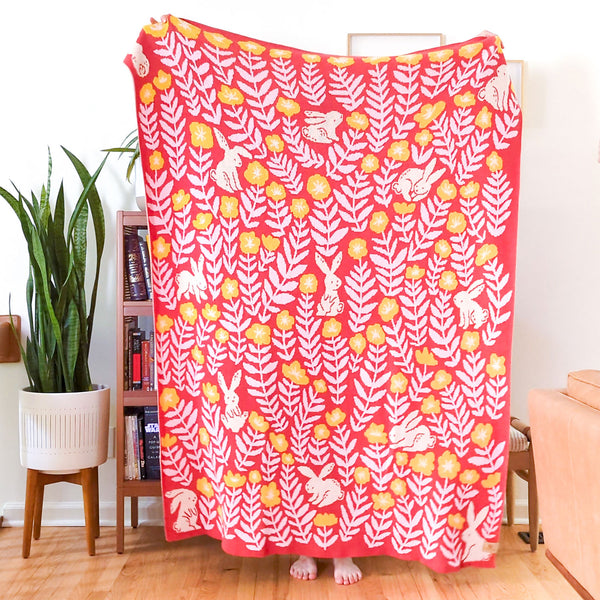 Bunny Meadows Throw Blanket - Coral
