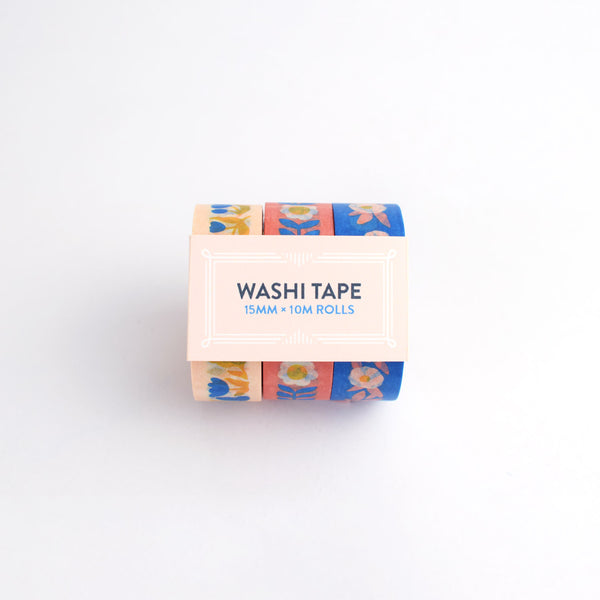 Three rolls of colorful floral washi tape by Nuthatch Studio.