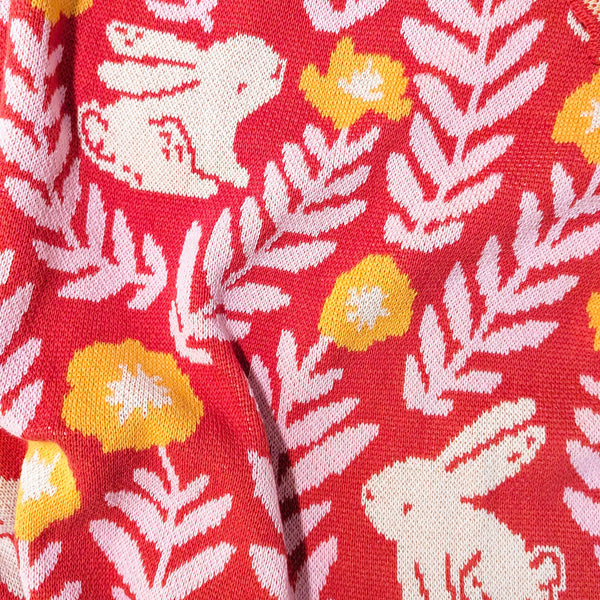 Bunny Meadows Throw Blanket - Coral