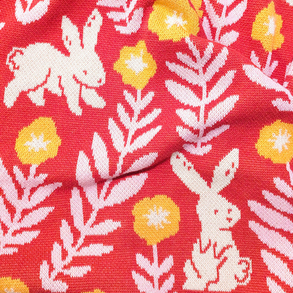 Bunny Meadows Throw Blanket - Coral
