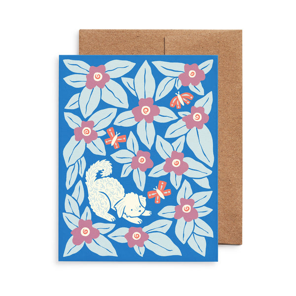 Greeting card with the illustration Bennie Blooms by Chrissie Van Hoever featuring a curly pup playing amidst blooms and butterflies.