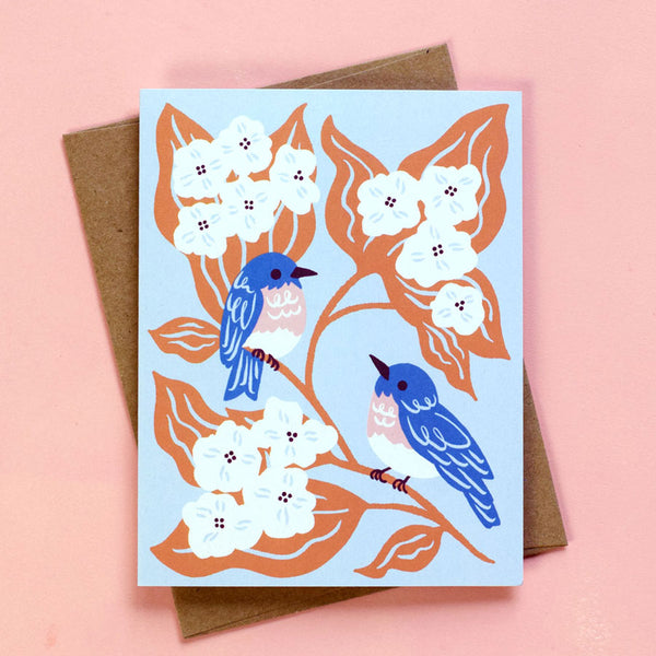 Illustrated greeting card featuring sweet Bluebirds amongst fluffy hydrangea blooms.