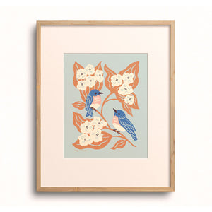 Bluebirds & Hydrangea Art Print by Chrissie Van Hoever displayed in a wooden frame with a white mat.