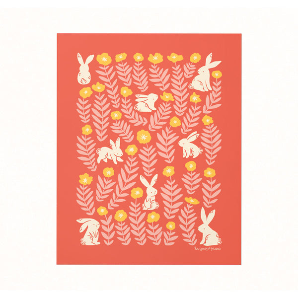Archival art print of an illustration of bunnies in a field of yellow and pink marigolds on a coral backdrop.