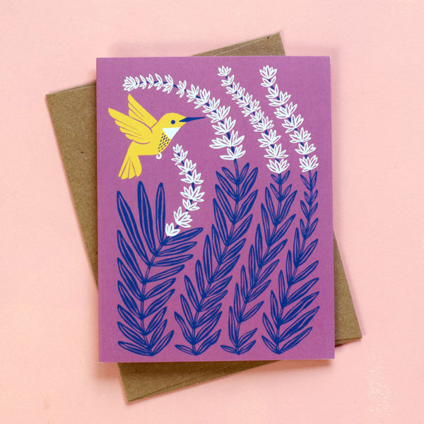 Illustrated greeting card featuring a bright yellow hummingbird sipping nectar from lavender blooms.