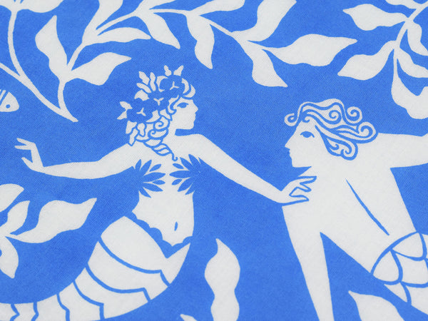 Close up view of mermaid with flowers in her hair in white on a cerulean blue background.