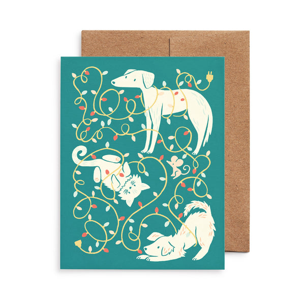 Greeting card with illustration of dogs and cat tangled up in Christmas lights