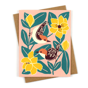 Illustrated greeting card with brown-headed nuthatches and big magnolia blooms on a dusty pink background.