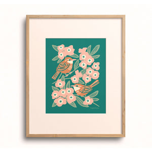 Wren & Rhododendron Art Print by Chrissie Van Hoever displayed in a wooden frame with a white mat.