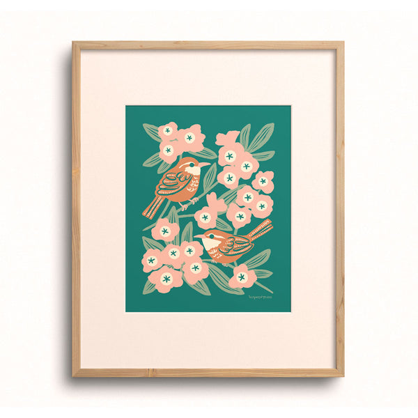 Wren & Rhododendron Art Print by Chrissie Van Hoever displayed in a wooden frame with a white mat.
