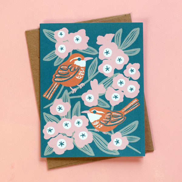 Illustrated greeting card featuring Carolina Wren perched amongst rhododendron blooms.
